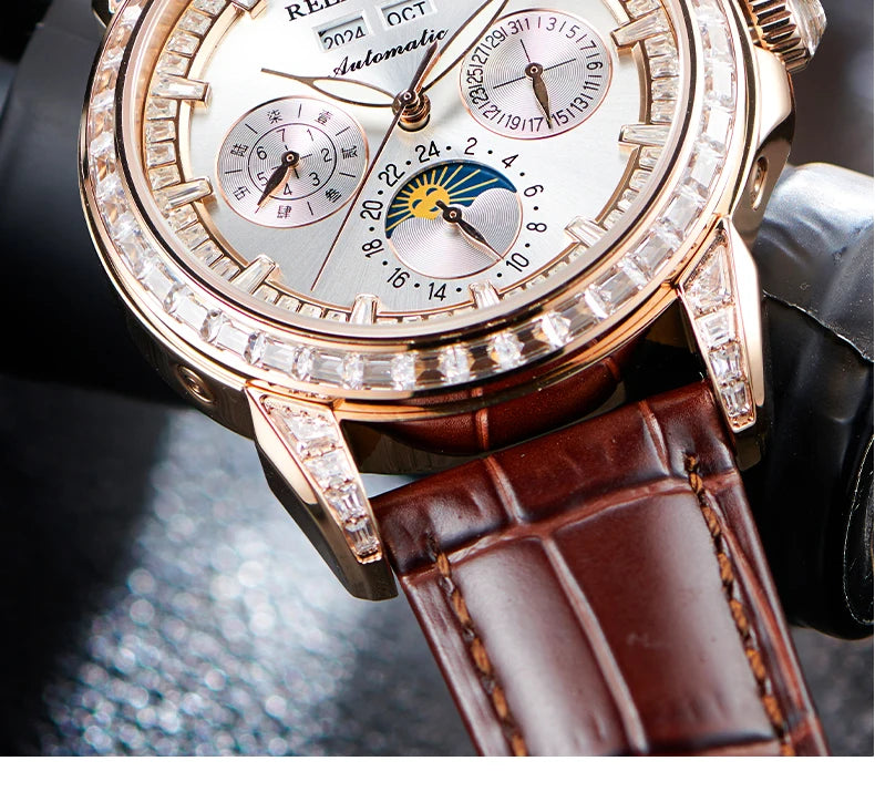 automatic moonphase  watch by reef tiger diamonds bezel, blue dial
