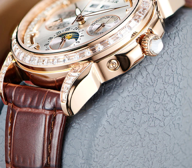 automatic moonphase  watch by reef tiger diamonds bezel, blue dial
