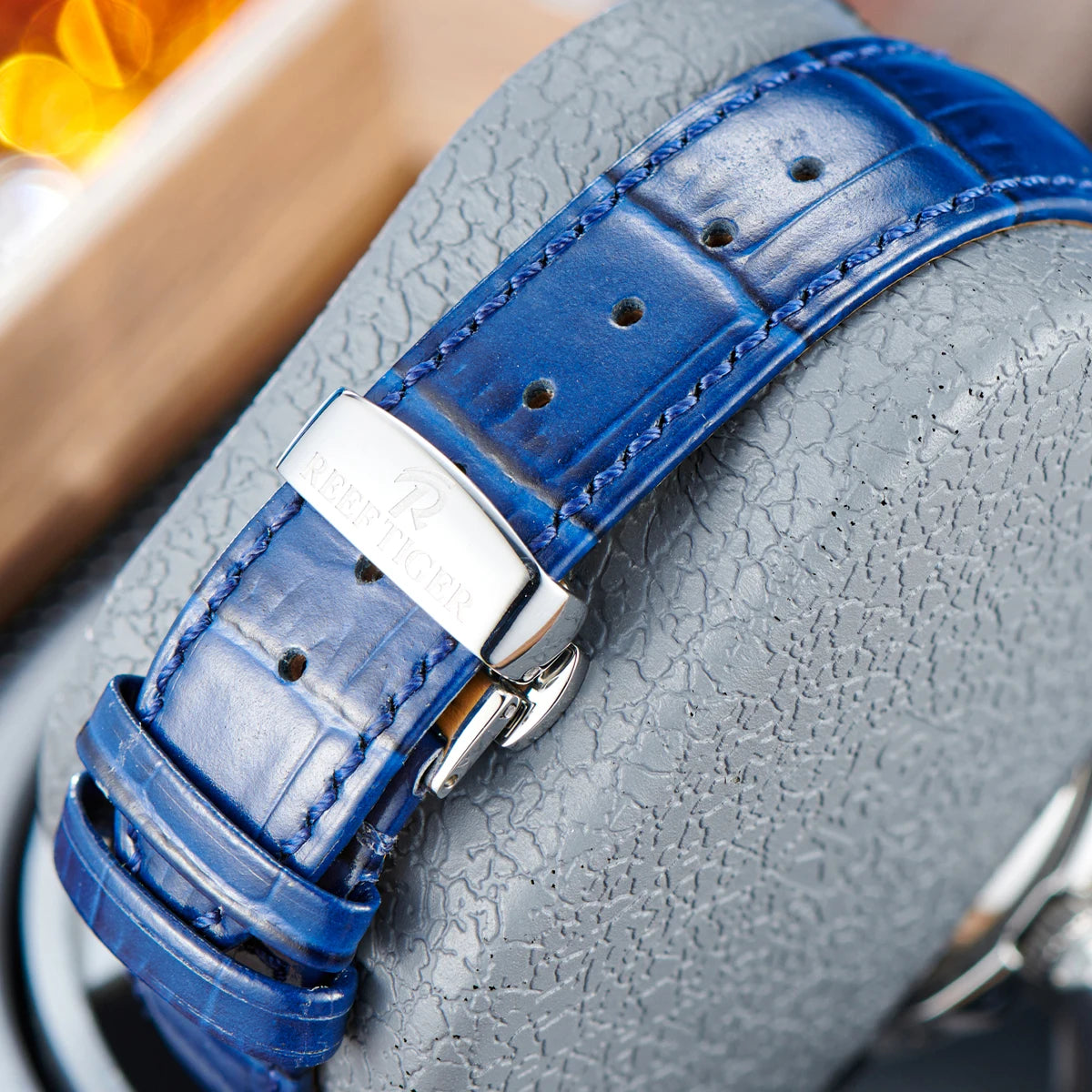 automatic moonphase  watch by reef tiger diamonds bezel, blue dial