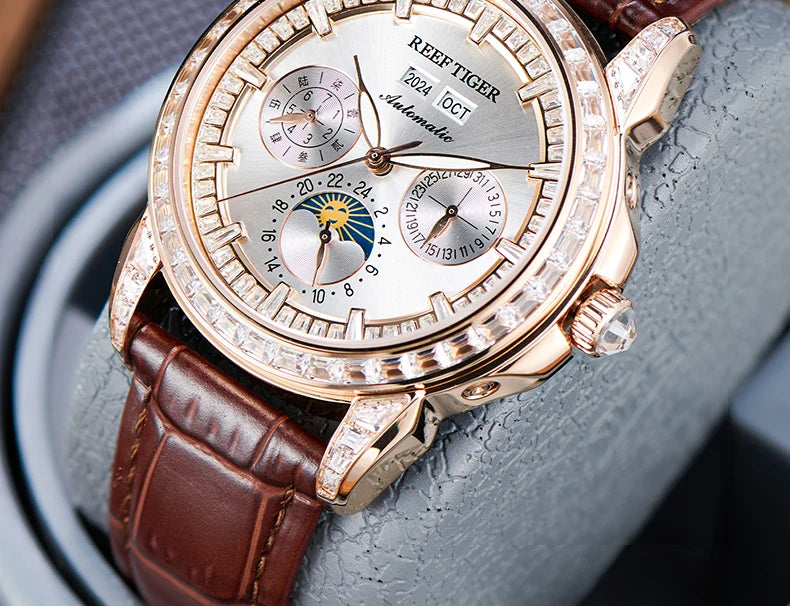 automatic moonphase  watch by reef tiger diamonds bezel, blue dial
