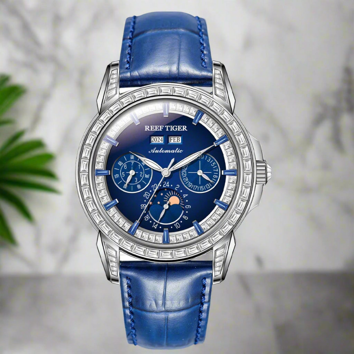 automatic moonphase  watch by reef tiger diamonds bezel, blue dial,b